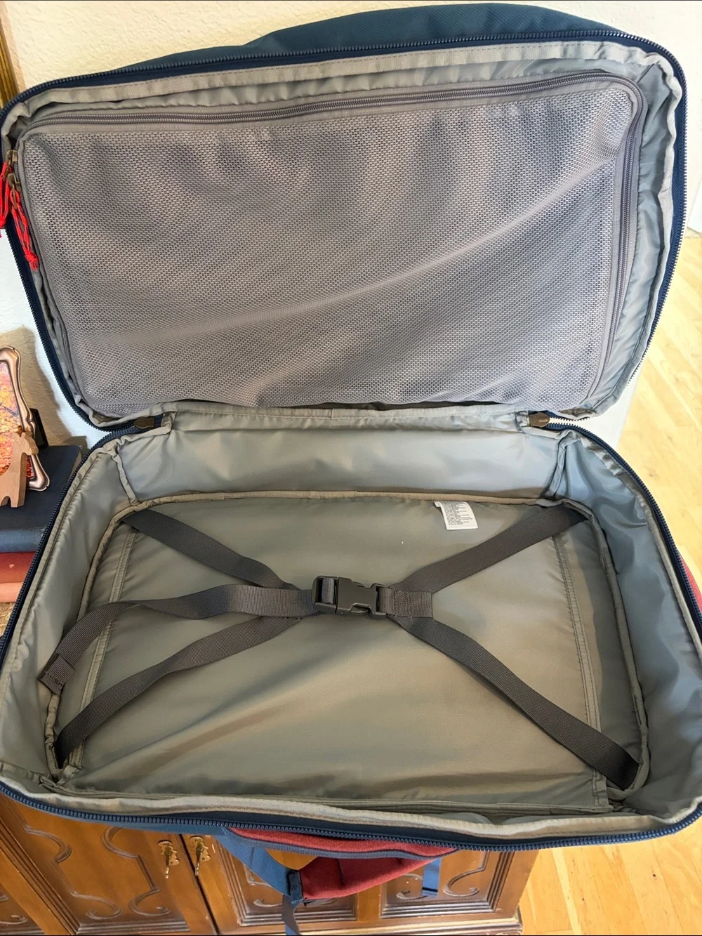 The North Face Travel Duffel Blue Backpack with Red Accents